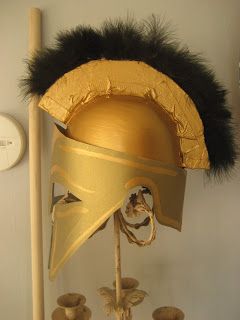 Chuck Does Art: DIY Spartan Hoplite Costume: How to Make a Helmet Aztec Helmet, Roman Crafts, Athena Goddess Costume, Goddess Costume Diy, Spartan Costume, Roman Soldier Helmet, Athena Costume, Greek Helmet, Soldier Helmet