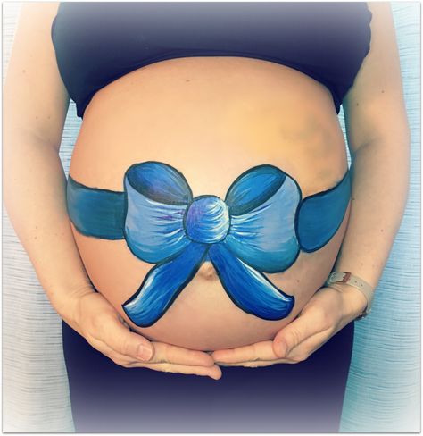 Bow Baby bump painting by Fey Faces Baby Belly Paintings, Belly Painting Ideas, Baby Bump Painting Ideas, Maternity Belly Painting Ideas, Belly Painting Pregnant Boy, Pregnant Belly Painting Ideas, Belly Painting Pregnant Easy, Painted Pregnant Belly, Belly Painting Pregnant