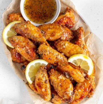 Honey Lemon Pepper Wings - Carmy - Easy Healthy-ish Recipes Honey Lemon Pepper Wings, Lemon Pepper Chicken Wings Recipe, Chicken Wing Sauce Recipes, Soy Garlic Chicken, Honey Wings, Lemon Pepper Sauce, Honey Chicken Wings, Turkey Stuffing Recipes, Teriyaki Chicken Wings