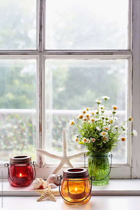 https://www.stocksy.com/2920308/small-colored-lanterns-with-flowers-on-window-sill Window Seal Ideas, Plants On Window Sill, Plant Window Sill, Window Ledge Decor, Window Sill Plants, Windowsill Ideas, Big Beautiful Houses, Lanterns With Flowers, Ledge Decor