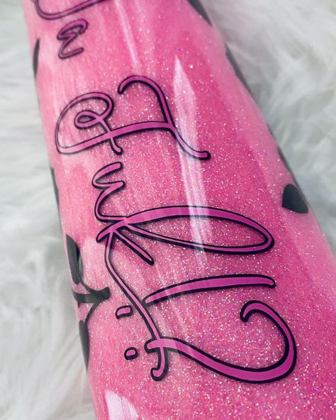 A custom 30 oz skinny tumbler: glow in the dark pink glitter, text in hot pink vinyl, black offset, with black roses. Love that shine! #glowinthedarkpink #custom30oztumblers #glowinthedarktumblers #tumblerwithroses #pinkandblacktumblers Pink Vinyl, Glitter Text, Black Roses, Pink Glitter, Black Rose, In Hot, Dark Pink, In The Dark, Glow In The Dark