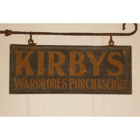 Edwardian wall hung shop sign, Kirbys’ wardrobes purchased A great piece of social history, this is a wooden sign painted on both sides and hanging on a blacksmith made Iron bracket, still in use in the 1930s when the phone number was squeezed in on the bottom line The sign is 39 x 12 inches, the overall size including the bracket is 49” x 20” Vintage Shop Sign, Antique Signs Wood, Vintage Store Signs, Antique Trade Sign, Wood Signage, Feed Store, Cafe Shop Design, Sign Painting, Antique Signs