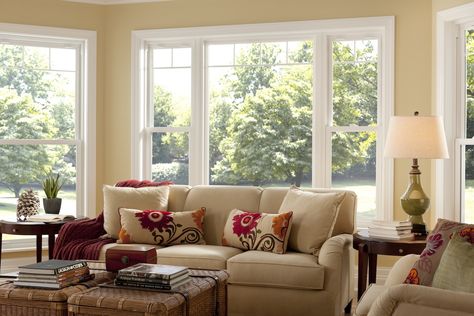 Large double hung and picture windows in brightly lit living room. Picture Windows Living Room, Farm Cabin, Shower Remodel Diy, Window Brands, Small Shower Remodel, Window Designs, Vinyl Windows, Window Planters, Room Addition