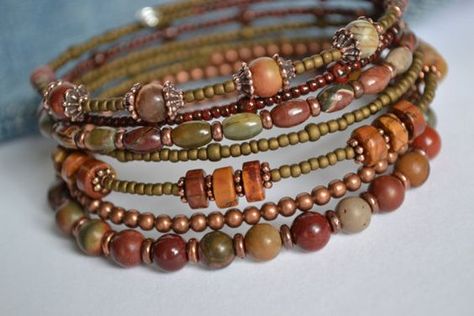 Fall colors jasper memory wire bracelet. Southwestern memory wire bracelet. Gorgeous earth tone Red Creek Jasper gemstones paired with antique copper and complimentary seed beads on memory wire. This particular bracelet wraps around your wrist 7 times and has the looks of 7 unique bracelets. The oval shape of this particular memory has a more natural fit for your wrist. listing of beads: Red Creek Jasper Tierra Cast antique copper beads and bead caps Toho seed beads: Memory Wire Jewelry, Memory Wire Wrap Bracelets, Beaded Memory Wire Bracelets, Red Creek Jasper, Wire Bracelets, Memory Wire Bracelet, Wire Wrapped Bracelet, Memory Wire Bracelets, Homemade Jewelry