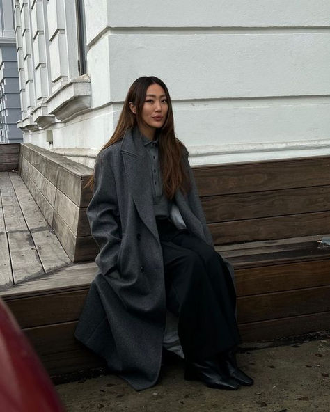 polished winter wardrobe inspiration : black wide leg trousers, grey collared top, long oversized charcoal coat, paired with black boots | Alice Wang (@itsalicewang) Long Grey Coat Outfit, Grey Coat Outfit, Long Grey Coat, Black Wide Leg Trousers, Collared Top, Wardrobe Inspiration, Grey Coat, Coat Outfits, Basic Style