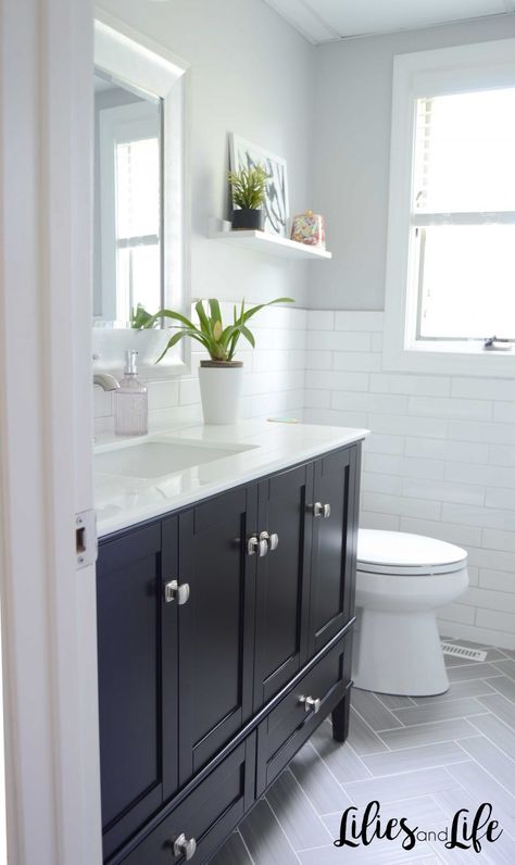 Powder Room Remodel, bathroom remodel | Lilies and Life - Interior Decorating | Blog | Home Decor | DIY Gray Herringbone Floor, Powder Room Remodel, Tile Walls, Modern White Bathroom, Bathroom Remodel Cost, Full Bathroom Remodel, Narrow Bathroom, Black Vanity, Herringbone Floor