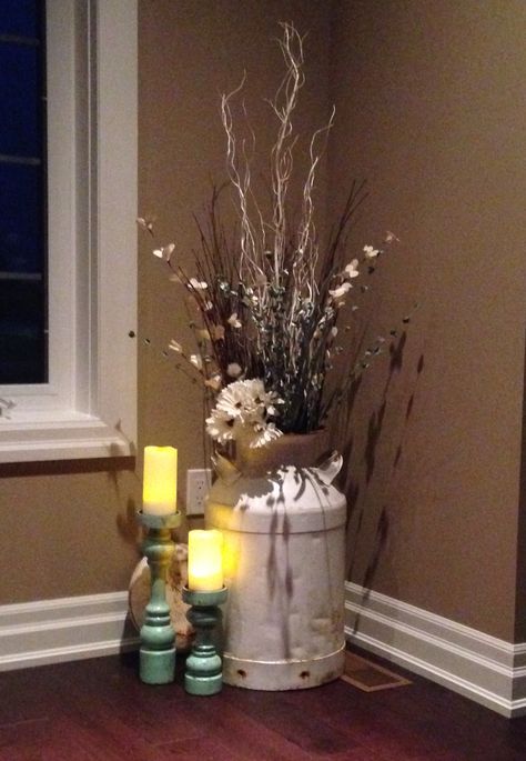 Antique Milk Can Ideas Living Room, How To Decorate An Old Milk Can, Milk Can Arrangements, Milk Can Decor Indoor Farmhouse, Decorating Milk Cans Ideas, Antique Crocks Decor Ideas Living Room, Milk Can Decor Indoor, Antique Crocks Decor Ideas, Crocks Decor Ideas