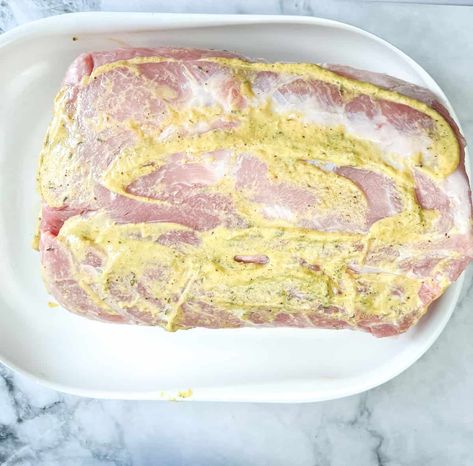 coating the pork with mustard Mustard Pork Loin Recipes, Pork Loin Mustard, Mustard Pork Loin, Pork Loin Slow Cooker, Pork Loin Recipes Slow Cooker, Pork Loin Recipes Oven, Pork Loin Crock Pot Recipes, Crockpot Pork Loin, Slow Cooker Pork Loin