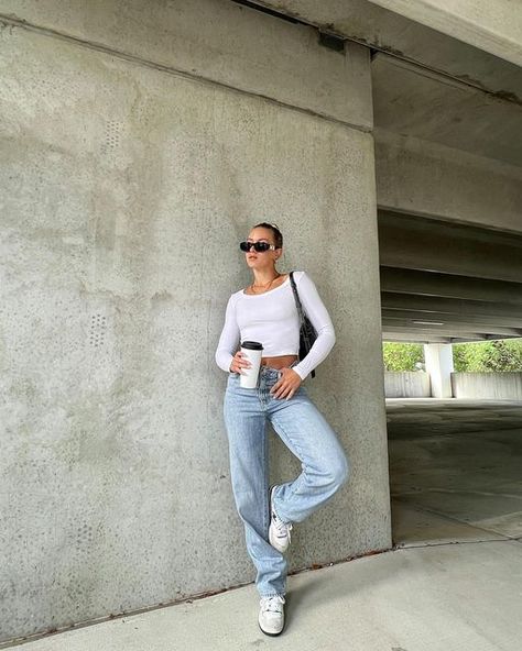 VANESSA FERRAIOLO on Instagram: "Flattering basics have my heart 🫶🏼 Top: @amazonfashion (linked on my storefront under “march 2023 links”) Jeans: @levis (linked on my storefront under “march 2023 links”) Shoes: @newbalancelifestyle (linked on my LTK) Sunnies: @versace (linked on my LTK) Bag: @polene_paris Jewelry: @mirandafrye (discount code VANESSA) & @cuffedbynano (linked on my LTK)" Emma Chamberlain Outfits Jeans, Emma Chamberlain Levis 501, Emma Chamberlain Levis, Vanessa Ferraiolo, Paris Jewelry, Jeans Levis, Heart Top, March 2023, Store Fronts