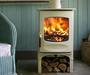 C-Four Wood Stove, by Charnwood.  a white wood stove, now there's an idea. Charnwood Stove, Store Stand, Wood Burners, Stove Fireplace, Log Burner, Wood Burner, Cool Ideas, Wood Burning Stove, Wood Burning Fireplace