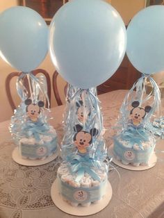 Baby Shower Diapers Centerpiece Mickey Mouse by designsbyemilys Boy Baby Shower Table, Baby Shower Minnie Mouse, Boy Baby Shower Decorations, Diaper Centerpiece, Diy Baby Shower Centerpieces, Mickey Baby Showers, Baby Shower Table Centerpieces, Boy Baby Shower Centerpieces, Mickey Mouse Baby Shower