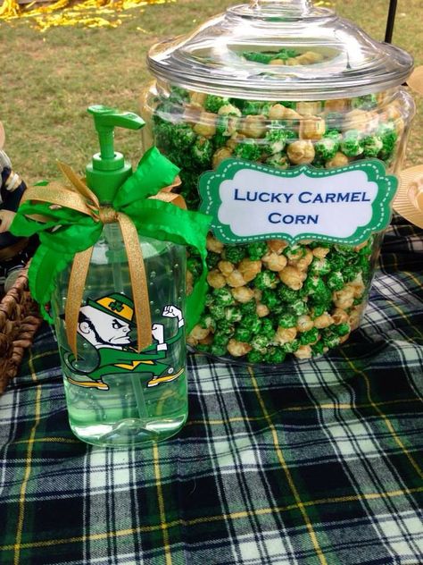 Notre Dame theme tailgate caramel corn and suds.  #GamedayGrub #NotreDame #FightingIrish #NotreDameTailgate #IrishTailgate #NotreDameFood #Popcorn #CaramelCorn #StPatricksDay #IrishFood #FootballParty Notre Dame Tailgate, Tailgate Treats, Football Tailgate Party, Nurse Party, Football Baby Shower, Irish Party, Go Irish, Chenille Patches, Tail Gate