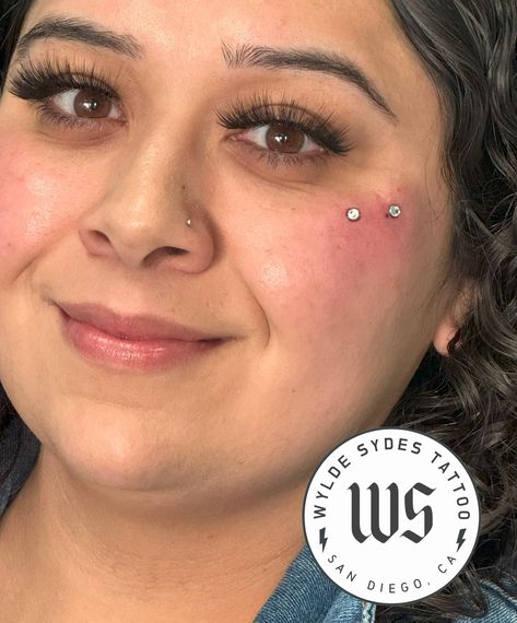 Two dermal implant piercings. All material implant grade titanium! www.wyldesydestattoo.com #bodypiercing #piercing #dermalpiercing #wyldesydestattoo #sandiego Double Dermal Piercing, Double Dermal Piercing Face, Dermal Face Piercing, Dermal Piercing Face, Face Dermal, Dermal Piercings, Piercing Face, Face Piercings, Dermal Piercing