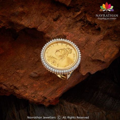 A regular gold coin ring is ornamented with diamonds. Its fine craftsmanship and the art of fine jewellery are reminiscent of a bygone era. It is specially created to suit and delight you. Walk into our stores and experience its pulse quickening design a treasure with thrilling craftsmanship and grab this Ginni Diamond Ring before it goes off the shelf or visit us at www.navrathan.com and get it immediately.  #Jewellery #Navrathan #Jewellers #Gold #Silver #Diamond #GoldNecklaceDesign #SilverArti Gini Ring In Gold, Ginni Necklace Design, Ginni Jewellery Design, Ginni Set Designs, Gold Coin Pendant Designs, Ginni Ring Designs Gold, Ginni Pendant Design, Ginni Pendant Design Diamond, Coin Rings Women