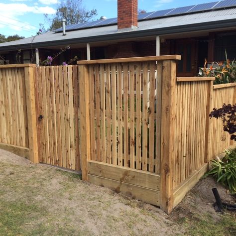 Flat top cyprus picket fence on a sloping property in Rosebud. Job completed by Regan Spence from Coastal Creations Landscaping on the Mornington Peninsula. Built to last, quality landscaping construction. Vertical Wood Fence, Fence On Slope, Coastal Creations, Wood Edging, Landscaping Projects, Building A Fence, Mornington Peninsula, Picket Fence, Wood Fence