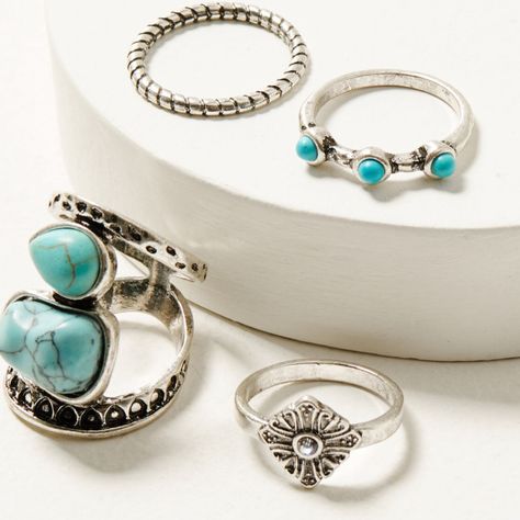 Product Details Set Includes 4 Rings Piece 1: Diamond Shape With Rhinestone Center And Painted Details Piece 2: Simple Band With 3 Turquoise Stone Accents Piece 3:Simple Roped Band With Painted Details Piece 4: Oversized Statement Ring With 2 Turquoise Pendants With Painted Details Silver-Toned Hardware Imported One Size Fits Most Western Jewelry Rings, Braided Ring Band, Turquoise Squash Blossom, Turquoise Gold Ring, Boot Barn, Silver Wrap Ring, Arrow Ring, Gold Band Ring, Western Jewelry