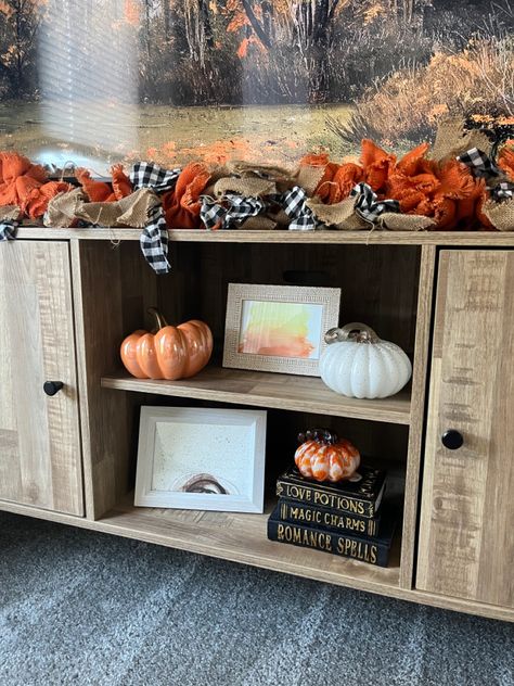 Entertainment Fall Decor, Fall Halloween Tv Stand Decor, Hobby Lobby Tv Stand Decor, Fall Decorations Tv Stand, Fall Decor Around Tv Stand, Fall Tv Decor Tv Stands, Fall Decorated Entertainment Center, Autumn Tv Stand Decor, Fall Decor Console Table Under Tv