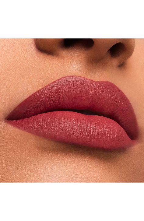 What it is: A long-wearing, lip-adoring lipstick with striking, plumping color in a velvety matte finish (coveted shades are refillable). What it does: Make the moment with a match for every power move. This long-lasting, high-performance lipstick saturates lips with statement-making, wearable color designed to flatter all skin tones. It stays color true and wears for 10 impactful hours while resisting bleeding, feathering and creasing. The plush powder complex delivers a smooth, velvety matte finish. The naturally derived Moisture Lock Complex provides extra lip-adoring care while you wear. Lips look immediately plump and smooth, with a more defined and sculpted appearance over time. The expertly designed bullet is perfectly shaped to help sculpt the curves of your lips with effortless pr Matte Lipstick Colors, Dream Makeup, Beauty Lips, How To Apply Blush, Women Lipstick, Makeup Help, Natural Lipstick, Eye Makeup Pictures, Glam And Glitter