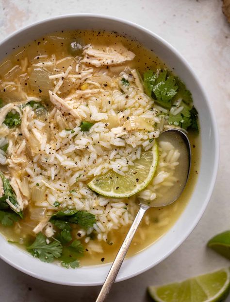 This ginger lime chicken soup is a bright and citrusy way to make dinner delicious! Served over cilantro lime rice, this is a cozy bowl that warms you right up. Ginger Lime Chicken, Lime Chicken And Rice, Lime Chicken Soup, Chicken Rice Soup, Lime Rice, Ginger Chicken, Soup And Stew, Soup Season, Chicken And Rice