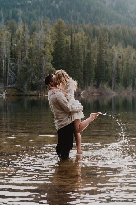 Playful and Perfect Engagements in Grand Teton National Park | Rocky Mountain Bride Pinterest Engagement Photos, Sultry Couples Photoshoot, River Engagement Photoshoot, Engagement Pictures In The Mountains, Engagement Photos On The Lake, Couple Shoot In Mountains, Mountain Picnic Photoshoot, In The Lake Photoshoot, Paint Mines Engagement Photos