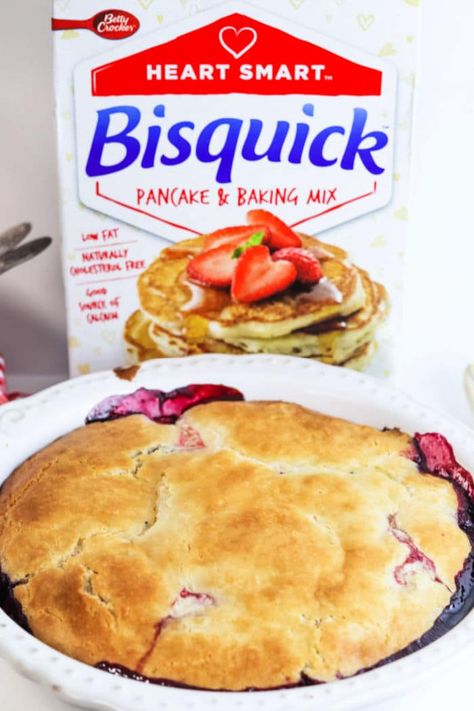 This Bisquick blackberry cobbler recipe turns out amazing with frozen fruit. Use cherry, blueberry, raspberry, strawberry or mixed combo. #bisquickcobbler #blackberrycobbler #fruitcobbler Bisquick Fruit Cobbler, Bisquick Recipes Strawberry Shortcake, Fruit Cobbler With Bisquick, Bisquick Plum Cobbler, Strawberry Cobbler With Bisquick, Strawberry And Blueberry Cobbler, Bisquick Cobbler Recipe, Bisquick Strawberry Cobbler, Bisquick Cherry Cobbler Recipe