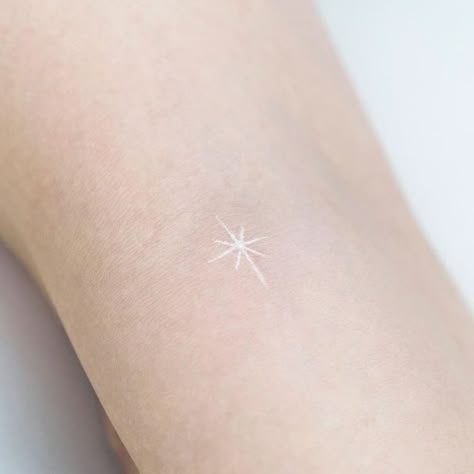 Cute Small Tattoo Ideas For Females, White Tattoo Fine Line, White Star Tattoos For Women, White Light Tattoo, White Ink Micro Tattoo, North Star Tattoo White Ink, White Dot Tattoo, White Minimal Tattoo, White Sparkle Tattoo