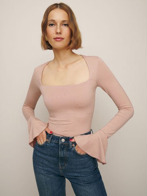 May cause compliments. Shop the Lucca Knit Top from Reformation, a long sleeve top with a straight neckline and slightly flared sleeve cuffs. Wrap Top Outfit, Frilly Blouse, Blush Pink Color, High Rise Wide Leg Jeans, Pretty Top, Cute Crop Tops, Lucca, Wide Leg Jeans, Fabric Care