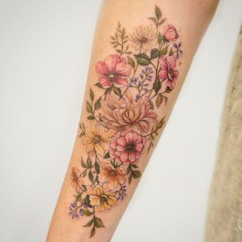 LOST SANCTUM TATTOO GC on Instagram: "Gorgeous wildflower tattoo by @asongtattoo 💐 #wildflowertattoo #cottagecore #floraltattoo #flowertattoo #botanicaltattoo #watercolourtattoo" Watercolour Wildflower Tattoo, Realistic Wildflower Tattoo, Colorado Wildflowers Tattoo, Vintage Botanical Tattoo, Wildflower Tattoo Sleeve, Quantum Tattoo, Wildflower Tattoo Ideas, Wildflower Tattoo Design, Wildflower Tattoos