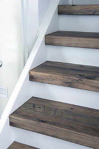 Top 70 Best Painted Stairs Ideas - Staircase Designs | Painted stairs, Diy stairs, Rustic stairs Rustic Basement Stairs, Stair Step Design Idea, Wood Top Stairs, Rustic Stairs Ideas, How To Redo Stairs, Farmhouse Stair Railing Ideas, Diy Stairs Makeover Cheap, Stairwell Remodel, Stairs Carpet To Wood