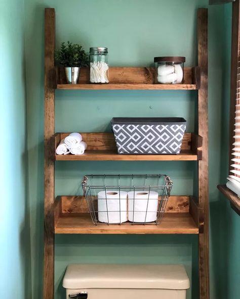 Bathroom Shelving Ideas, Above The Toilet Storage, Over The Toilet Ladder, Making Shelves, Dark Wood Shelves, Brass Shelving, Black Bathroom Hardware, Shelves Above Toilet, Retro Shelves