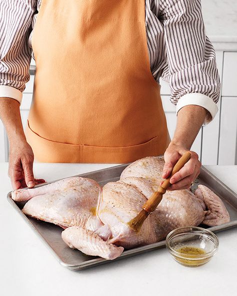 Place the turkey on a rimmed baking sheet. Let stand for 30 minutes. Use a basting brush to apply oil mixture. To roast turkey, follow the recipe's instructions. Stuffing A Turkey, Stuff A Turkey, Turkey Baster, Thanksgiving Food Sides, Whole Turkey, Dark Meat, Turkey Dinner, Turkey Breast, Roasted Turkey