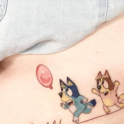 Reggae on Instagram: "#bluey #matchingtattoos for Chris and Gail

#tattoo #ink #inked #tattooed #ballon #bingo #script #cartoon #ribstattoo #biceptattoo #dog #fineline #writings #tvshow" Bluey Tattoos, Bicep Tattoo, Matching Tattoos, S Tattoo, Bingo, Tattoos, Instagram