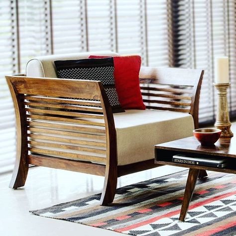 #Furniture #Comfy #Livingroom #Wooden #Seating #Cotton #Woven #Vibrant #Cushion #Patterns #Contemporary #Geometric #Rug #Living #Space #Blinds #Red #Black #Design #Spruce  #Center #Table #CandleHolder #Festive #Shopping #fabindia Arm Chair Living Room, Wooden Furniture Design, Contemporary Couches, Furnitur Ruang Keluarga, Wooden Sofa Set Designs, Chair Design Wooden, Wooden Sofa Designs, Chair Living Room, Wood Furniture Design