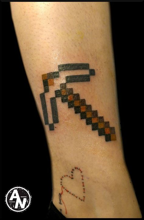 Minecraft pickaxe tattoo on calf Minecraft Tattoo Minimalist, Pickaxe Tattoo, Minecraft Tattoo Ideas, Tattoo Ideas Black And White, Tattoo On Calf, Minecraft Pickaxe, Minecraft Tattoo, Tattoo Ideas Black, Tattoo Calf