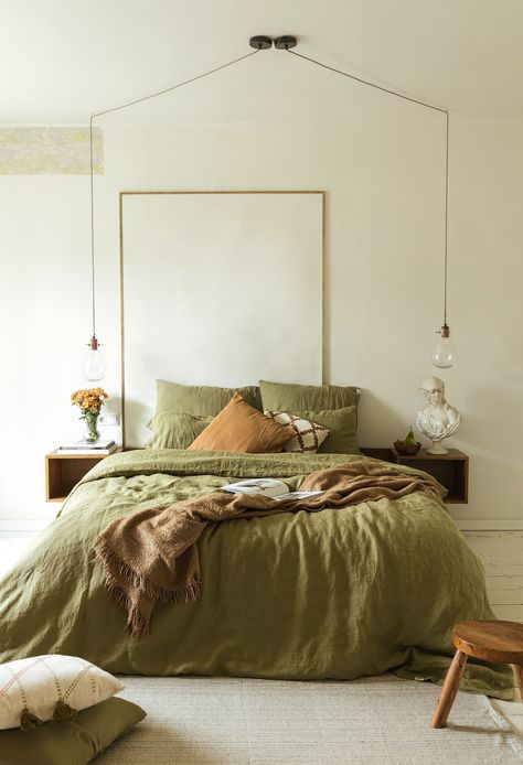 Soft Linen Bedding, Green And Yellow Bedroom Decor, Green Bedding With Pillows, Olive Bedding Bedroom, Green Painted Bed, Earthy Tone Bedroom Aesthetic, Rust And Green Bedding, Apartment Bed, Uncentered Bed