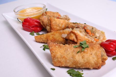 Jerk Chicken Eggrolls with Mango Dipping Sauce Jerk Chicken Egg Rolls Dipping Sauces, Jerk Chicken Eggrolls, Jerk Chicken Dipping Sauce, Jerk Egg Rolls, Jerk Chicken Egg Rolls Recipes, Jerk Chicken Egg Rolls, Rolled Dumplings Recipe, Eggs Rolls, Mango Dipping Sauce