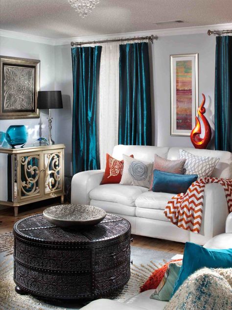 Transitional living room satin blue curtains - Home Decorating Trends - Homedit Teal And Orange Living Room Decor, Teal Blue Living Room, Fabulous Living Room Decor, Orange Bedroom Decor, Teal Living Room Decor, Living Room Turquoise, Teal Living Rooms, Transitional Decor Living Room, Living Room Decor Gray