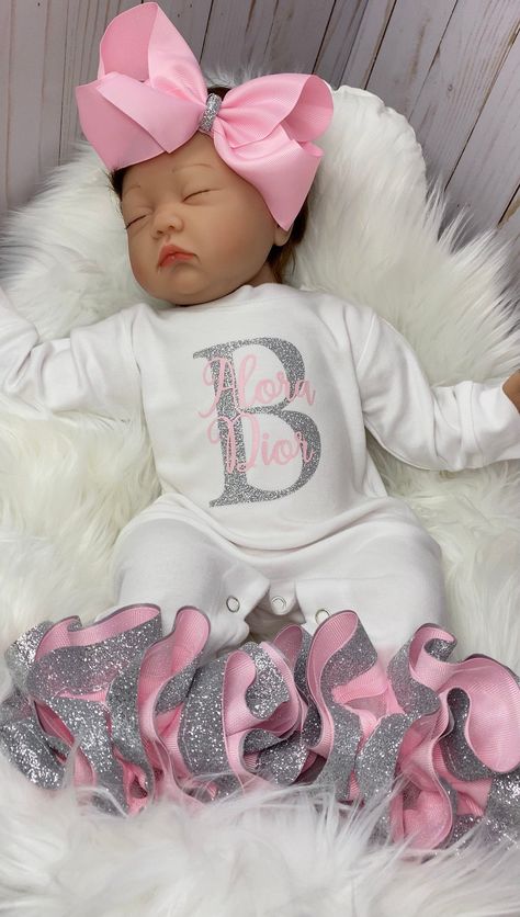 "100% COTTON This adorable customized outfit will have everyone in admiration of your little princess. This customized bodysuit is the perfect outfit for any occasion! Also offers an adorable large handmade ribbon bow with the perfect amount of sparkle and glam! The bodysuit is accented with matching handmade ribbon anklets (which are removable for easy cleaning and style changes, how awesome). The anklets offer the perfect fluffy look for your little one, which we receive endless compliments on Baby Shower Outfit Ideas, Maternity Photography Poses Pregnancy Pics, Newborn Clothing, Newborn Mom, Personalized Newborn, Hospital Outfit, Baby Girl Outfit, Baby Shower Outfit, Set Outfits