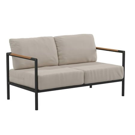 Enjoy your morning matcha tea or favorite coffee while you watch the sun come up when you purchase this modern indoor/outdoor loveseat. Boasting a black metal frame with teak accented arms as well as included back and seat cushions, everything you need to create a gorgeous seating area is included in the box. The straight frame arms give you a platform to rest your hands while you apply that great new shade of nail upgrade. Bring along their pet bed and let your four-legged friend relax alongsid Indoor Outdoor Patio, Patio Loveseat, Outdoor Loveseat, Deep Seat Cushions, Patio Lounge, Beige Cushions, Matching Chairs, Black Metal Frame, Cushion Fabric