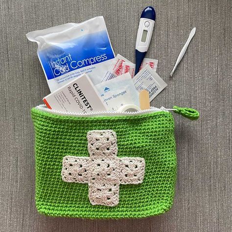 Crochet Your Own First Aid Kit | Creative Crochet Corner How To Crochet A Pouch, Crochet For School Ideas, Crochet First Aid Kit, Sewing First Aid Kit, Sew First Aid Kit, Crochet Handsanitizer Pouch Free Pattern, Crochet Utility Pouch, Practical Crochet Projects, First Aid Kit Box