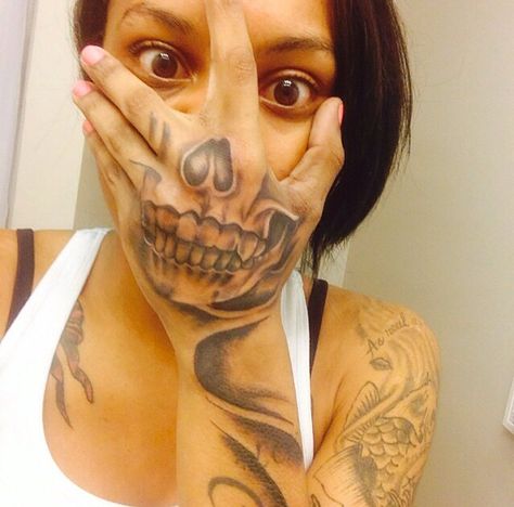 Artist tbandz skeleton tattoo on hand Hand Tattoo Skeleton Face, Hand Tattoos For Women Skull Face, Head Skeleton Tattoo, Skeloten Tattoo, Skeleton Tattoo On Hand, Skeleton Face On Hand Tattoo, Skeleton Face Tattoo, Skeleton Hand Okay Sign Tattoo, Skeleton Hand Tattoos Women