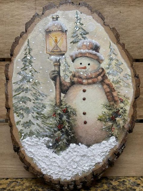 Official Mod Podge Group | Snowman on a wood slice  | Facebook Reversible Wood Slice Pumpkins And Snowman, Decoupage Pictures On Wood, Decoupage On Wood Slices, Decoupage On Canvas Ideas, Wooden Mittens Wood Crafts, Santa Wood Slice Ornament, Wood Slice Crafts Diy Ideas, Modge Podge Christmas Crafts, Wood Slice Christmas Crafts