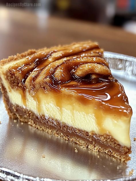 A creamy, cinnamon-infused Honey Bun Cheesecake topped with icing and caramel drizzle—perfect for any occasion! Bacon Caramel Cheesecake, Honey Cinnamon Dessert, Cinammon Roll Honey Bun Cheesecake, Cinnamon Honeybun Cheesecake, Honey Based Desserts, Cinnamon Honey Bun Cheesecake, Cinnamon Roll Honey Bun Cheesecake, Honey Bun Cheesecake, Honey Bun Cookies