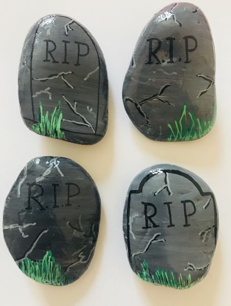 Tombstone painted pebbles Tombstone painted rocks Halloween painted pebbles Halloween painted rocks RIP Painted pebble RIP Painted rock Rip Painted Rocks, Rip Rock Painting Ideas, Tombstone Rock Painting, Goth Rock Painting, Spooky Rock Painting, Tombstone Painting, Halloween Painted Rocks Ideas Easy, Halloween Stone Painting, Halloween Pebbles