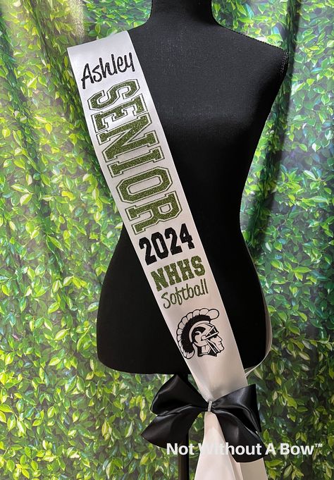 "Make the event memorable with a custom senior night sash! This listing allows you the option of customizing just the front of the sash or adding text to the back of the sash (this is an additional fee) Created with top quality satin ribbon. Size: One size fits most. Total sash length is 36\" Ribbon Width: 4\" (shown in sample photo)  Sash will NOT be sewn and a safety pin will be included to allow for a custom fit. Customize Your Senior Sash! Text On Back Of Sash If you are upgrading to have text on the back of the sash - it is a firm 10 character limit. Any request over 12 characters will require a different font AND fee. Please contact us with questions prior to purchasing Please be very detailed in the comment section to avoid delay of processing. -Choose SENIOR layout from photo - cle Senior Night Sashes Softball, Senior Sash Ideas, Senior Night Sash, School Names, Cheer Apparel, Senior Sash, Cheer Life, Softball Gifts, Dance Ideas