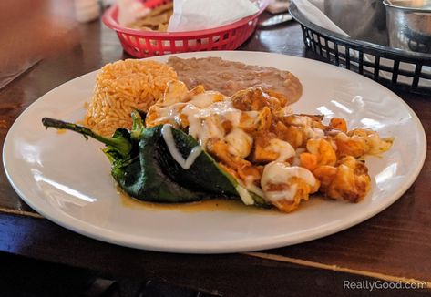 In Mexico, a chile relleno consists of a stuffed, roasted, fresh poblano pepper. In this case it was stuffed with shrimp and melted cheese. Chille Relleno, Tiger Prawn, Chile Relleno Recipe, Stuffed Poblanos, Poblano Pepper, Chile Relleno, Easy Healthy Meal Prep, Stuffed Poblano Peppers, Melted Cheese