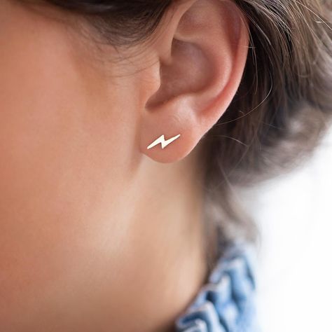 Add some spark to your earring collection with the Lightning Bolt Stud Earrings. Available in Sterling Silver or Gold Plated Sterling Silver and perfect with any outfit.These cute little lightning flashes come on a Personalised gift card presented in a Luxury gift box. They look great mixed with other earrings as well as by themselves and make an awesomely electric gift! Available in Gold Plated Sterling Silver and Sterling SilverPersonalise your Gift Packaging with a name an Lightning Earrings, Fancy Stuff, Lightning Bolt Earrings, Sterling Silver Initial, The Lightning, Earring Collection, Kids Necklace, Star Earrings Stud, Infinity Necklace