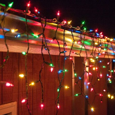 PRICES MAY VARY. [ 100 MULTICOLOR INCANDESCENT ICICLE LIGHTS ]  100 multi color traditional incandescent icicle lights on green wire, 18 vertical drops in lengths of 18", 9", 15", and 12"; approximately 5 ft. lighted length, 12” lead, 4” tail. [ END TO END EXPANDABLE ]  Safely connect 5 sets end to end for 25' total coverage on one plug - 42.5 watts (0.36 Amps) per set. 120-volt fused non-polarized male plug and female plug for end to end connections. Powered by STANDARD 120 VOLT household outle Holiday Lights Outdoor, Solar Christmas Lights, Icicle Christmas Lights, Potted Christmas Trees, Hanging Christmas Lights, Bulb String Lights, Icicle Lights, Bubble Lights, Garden Christmas