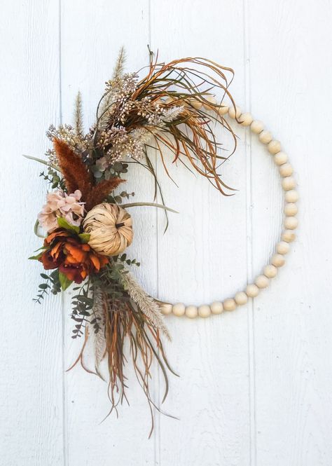 30 Boho Autumn Wreaths You Need To See - The Decor Forum Pampas Grass Fall Wreath, Christmas Pampas Wreath, Fall Wreath With Pampas, Fall Dried Wreath, Cheap Diy Fall Wreath, Boho Fall Outdoor Decor, Boho Bead Wreath, Eucalyptus Fall Decor, Fall Hoop Wreaths For Front Door