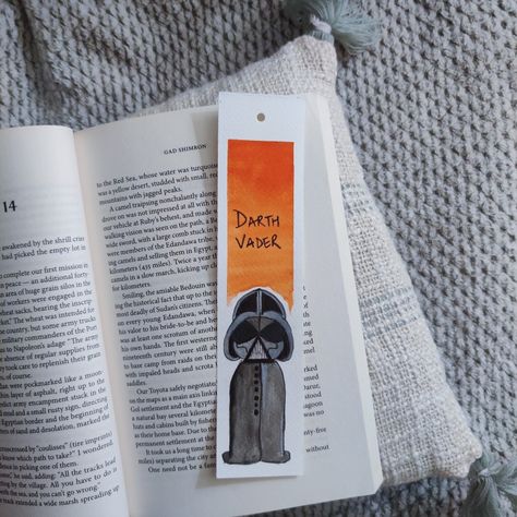 My second last bookmark from starwars collection #starwarscollection #darthvaderedit #bookmarkalert #bookmarksofinstagram #watercllorpainting #handmadebookmarks #darthvader #watercolourist #watercoloursheet #newcollection1 Starwars Bookmark, Origami Book, Bookmark Collection, Handmade Bookmarks, Red Studs, Book Origami, Watercolor Bookmarks, Book Marks, Star Wars Collection